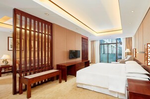 Ropa de cama de alta calidad, cubrecamas y minibar 