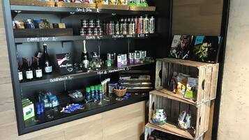 A well-organized beverage and snack display with various brands and types of products.