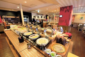 A buffet area with various food stations and a drink bar in the background. - Richmond Hotel Matsumoto (Matsumoto)
