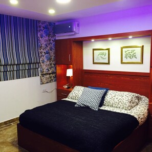 Business Apartment, 1 Bedroom, Patio | 1 bedroom, in-room safe, soundproofing, iron/ironing board - The Royal Luxury Apartments & studios (Amman)