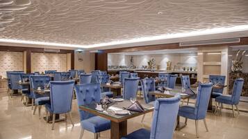 Breakfast, lunch, dinner served; international cuisine