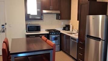 Suite, 2 Bedrooms (Hearing Accessible) | Private kitchen | Coffee/tea maker, fridge, microwave, oven