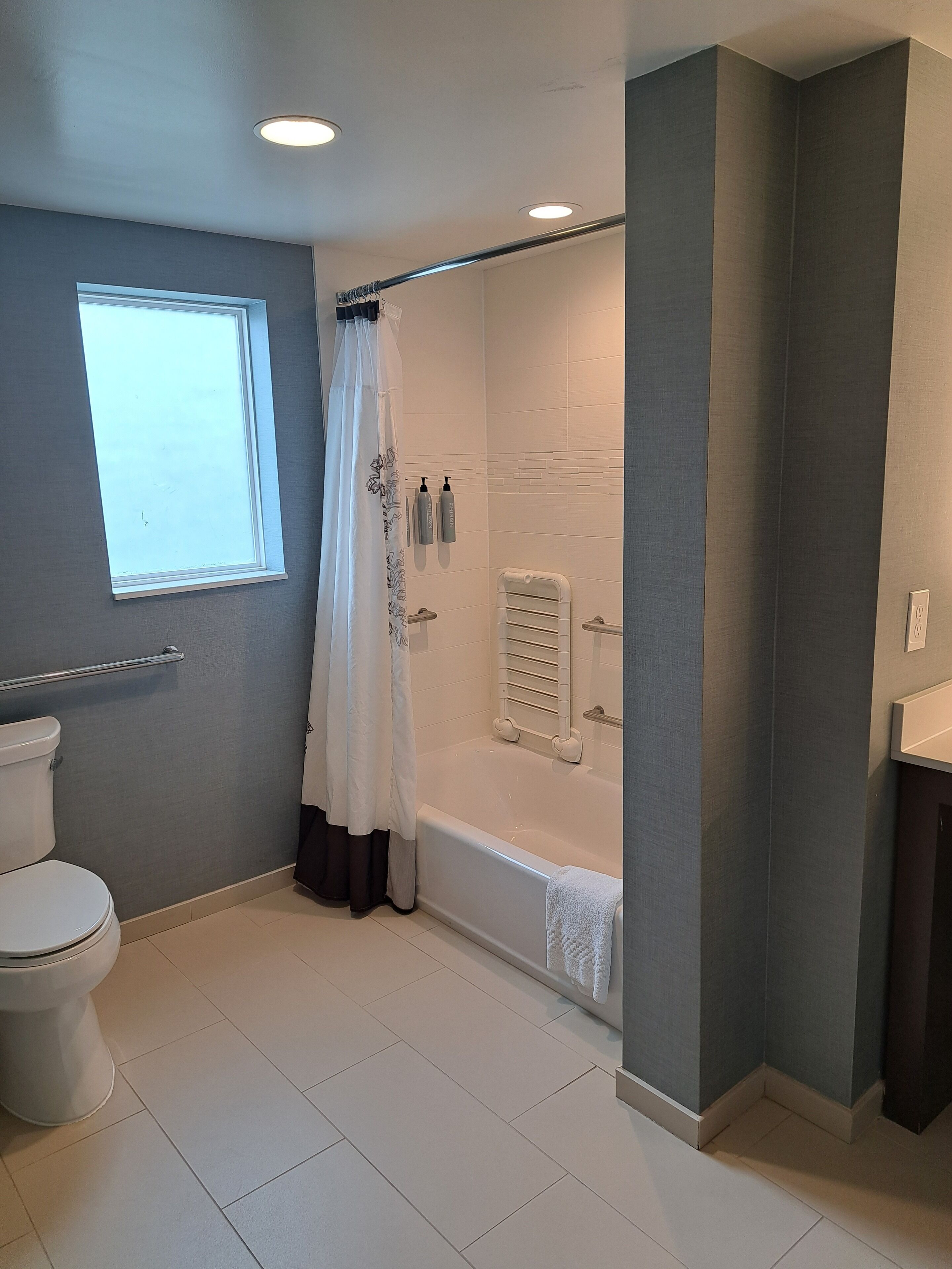 suite, 1 bedroom (mobility accessible, tub) | bathroom | hair dryer, towels