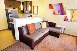 Studio, 1 King Bed with Sofa bed | Living area | 40-inch Smart TV with cable channels, TV, Netflix