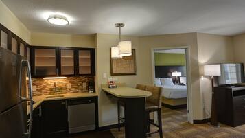 Full-sized fridge, microwave, stovetop, dishwasher