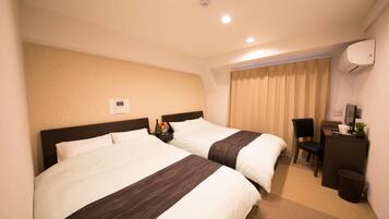 Desk, blackout drapes, free WiFi, bed sheets