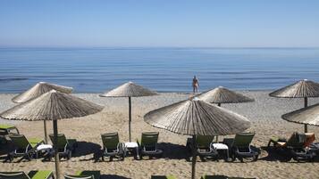 On the beach, beach towels, beach volleyball, beach bar