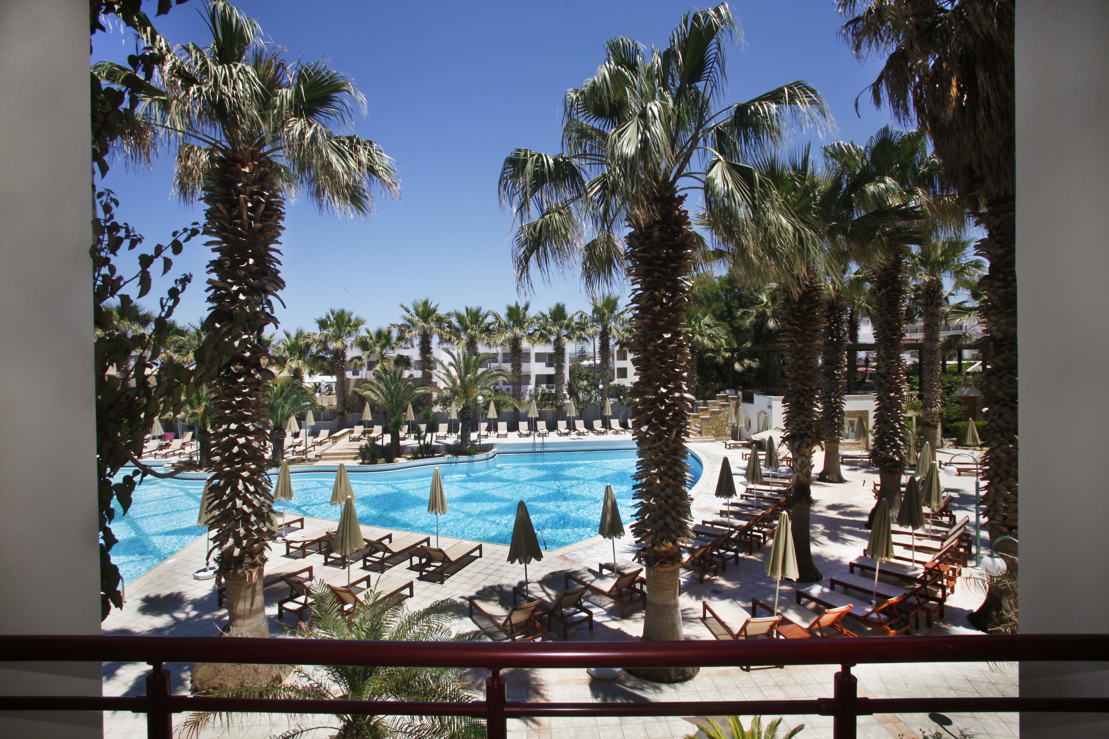 twin room, pool view | outdoor pool | seasonal outdoor pool