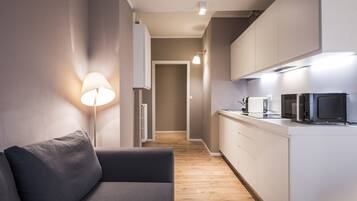 Classic Apartment (Via Sant'Andrea 20) | Private kitchen | Fridge, microwave, oven, stovetop