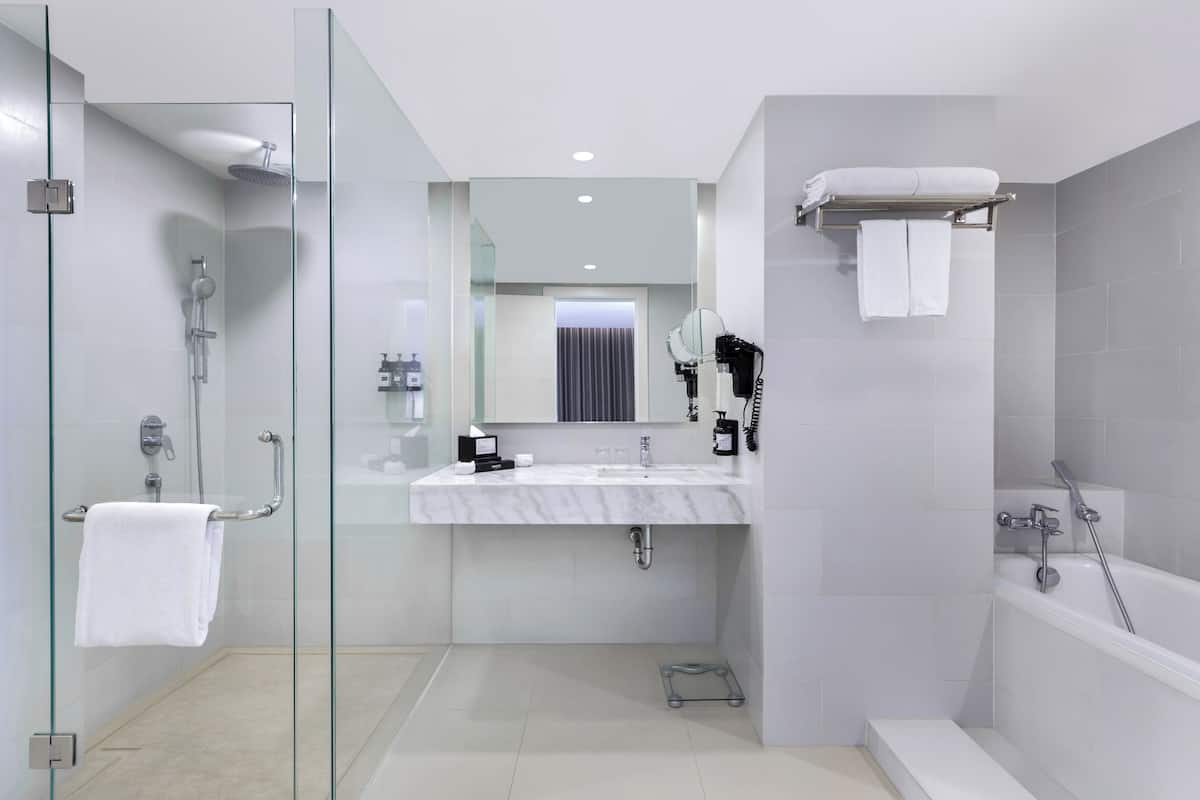 the townhouse | bathroom | shower, eco-friendly toiletries, hair dryer, towels
