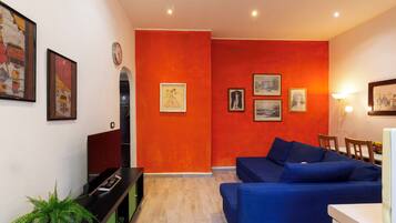 Appartement, 1 chambre | Coin séjour | Télévision à écran plat