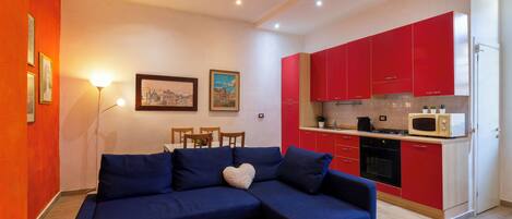 Apartment, 1 Bedroom | Living area | Flat-screen TV