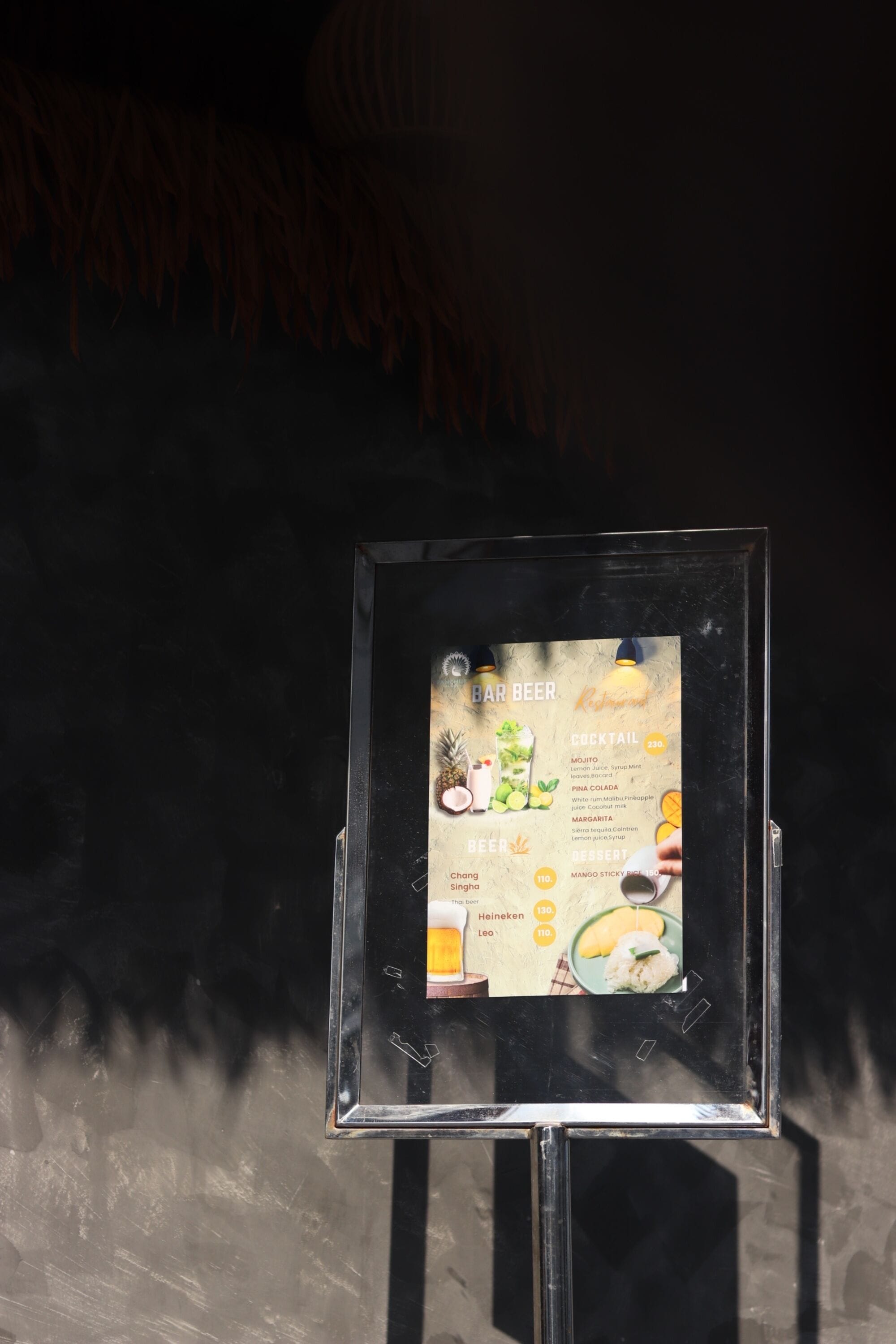 A menu board with various drink options and prices.