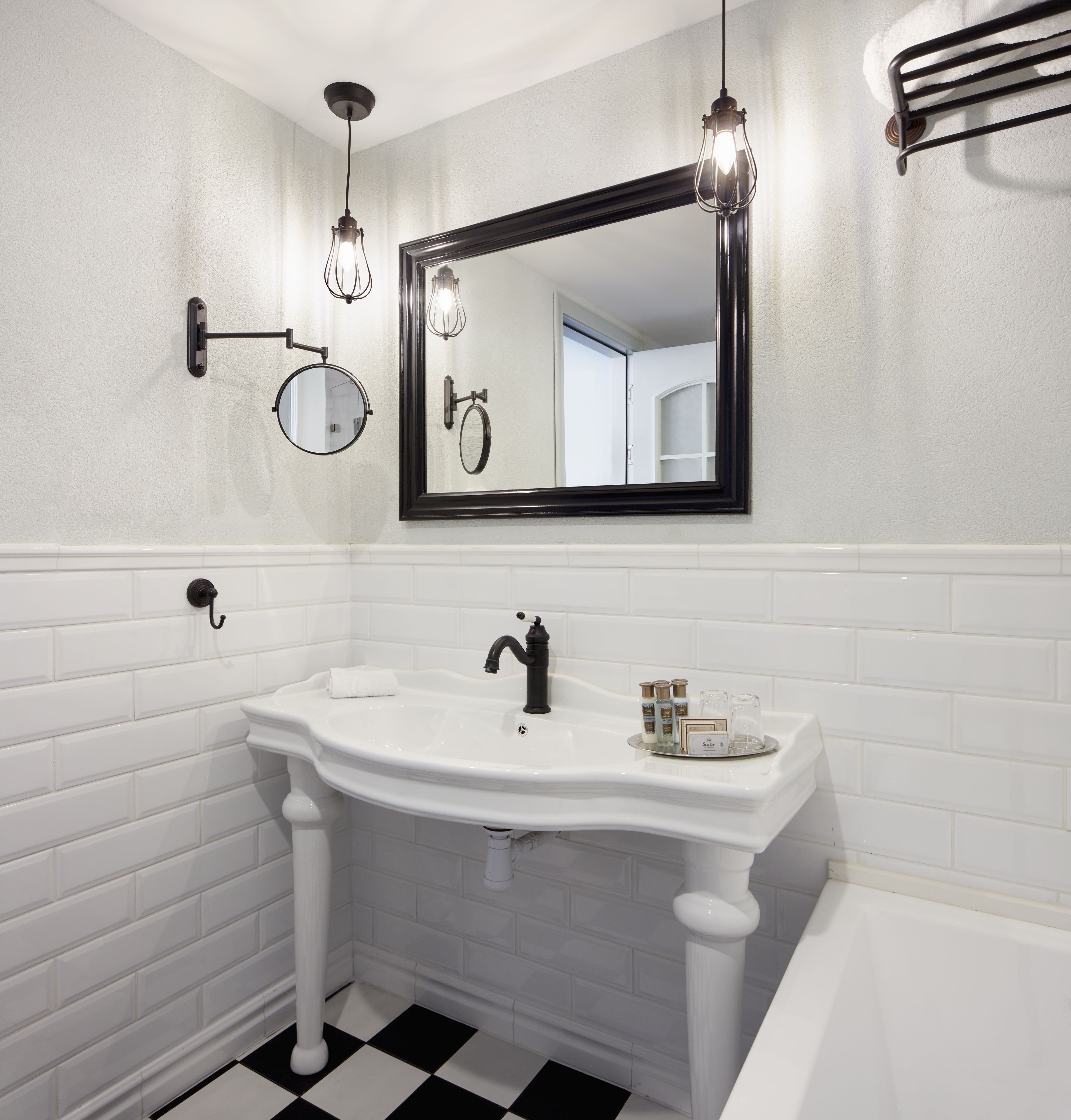 designer toiletries, hair dryer, towels