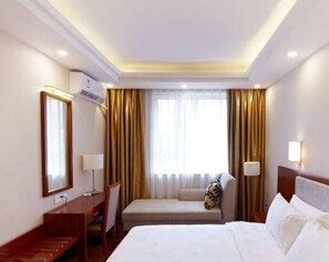 Phòng Suite Deluxe | Minibar, bàn, màn/rèm cản sáng, giường gấp/giường phụ (phụ phí) 