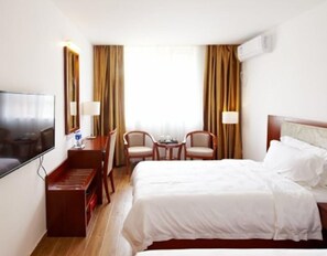Phòng 2 giường đơn Deluxe | Minibar, bàn, màn/rèm cản sáng, giường gấp/giường phụ (phụ phí) 