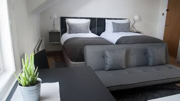 Premium bedding, desk, iron/ironing board, free WiFi