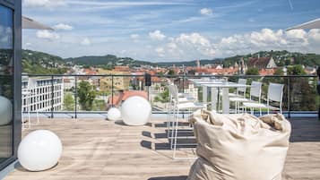 Rooftop bar, garden views, open daily