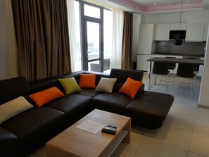 Apartment, 2 Bedrooms, Non Smoking | Living area | Flat-screen TV - Suncity Apartments Hotel (Accra)