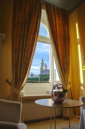 Deluxe Apartment (Wawel view, Smocza 1 street) | Living area | Flat-screen TV - Magic Apartments (Kraków)