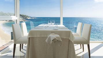 Breakfast, lunch, dinner served; Mediterranean cuisine, beach views