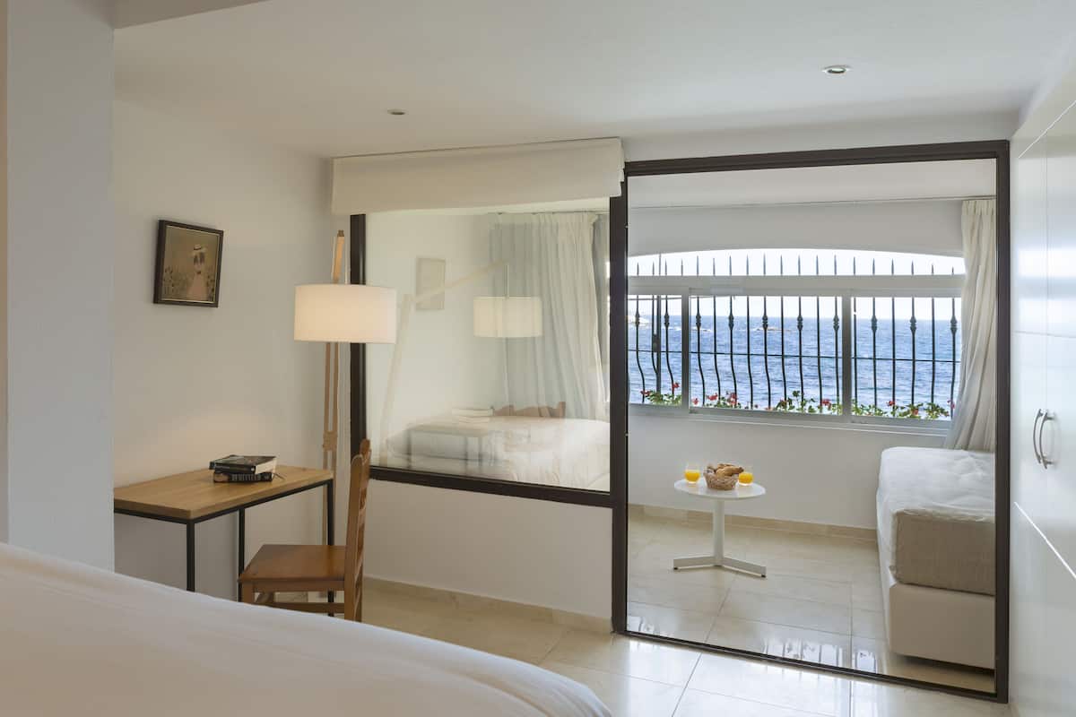 Habitación familiar, varias camas | Ropa de cama de alta calidad y minibar