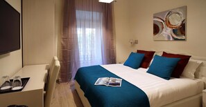 Deluxe-Doppelzimmer | Minibar, Zustellbetten, kostenloses WLAN, Bettwäsche