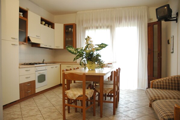 Apartment, 1 Bedroom | Living area | TV