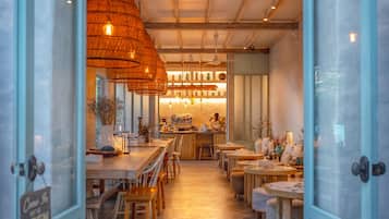 Breakfast, lunch, dinner served; local and international cuisine