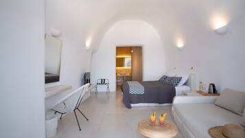 Superior Suite with Caldera View and Private Jacuzzi | Down duvets, pillow-top beds, in-room safe, soundproofing
