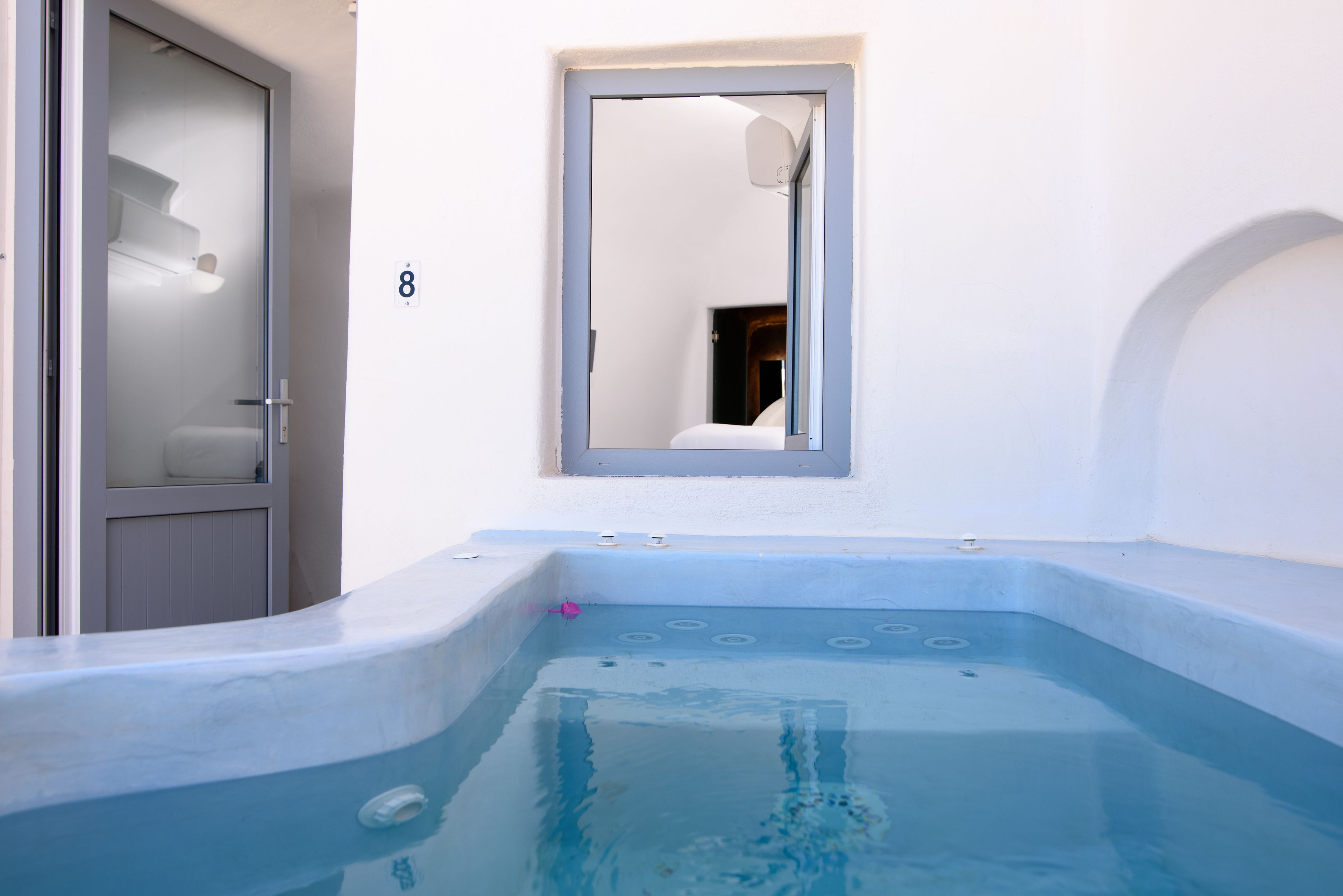 junior suite with caldera view and private jacuzzi - a- | jetted bathtub