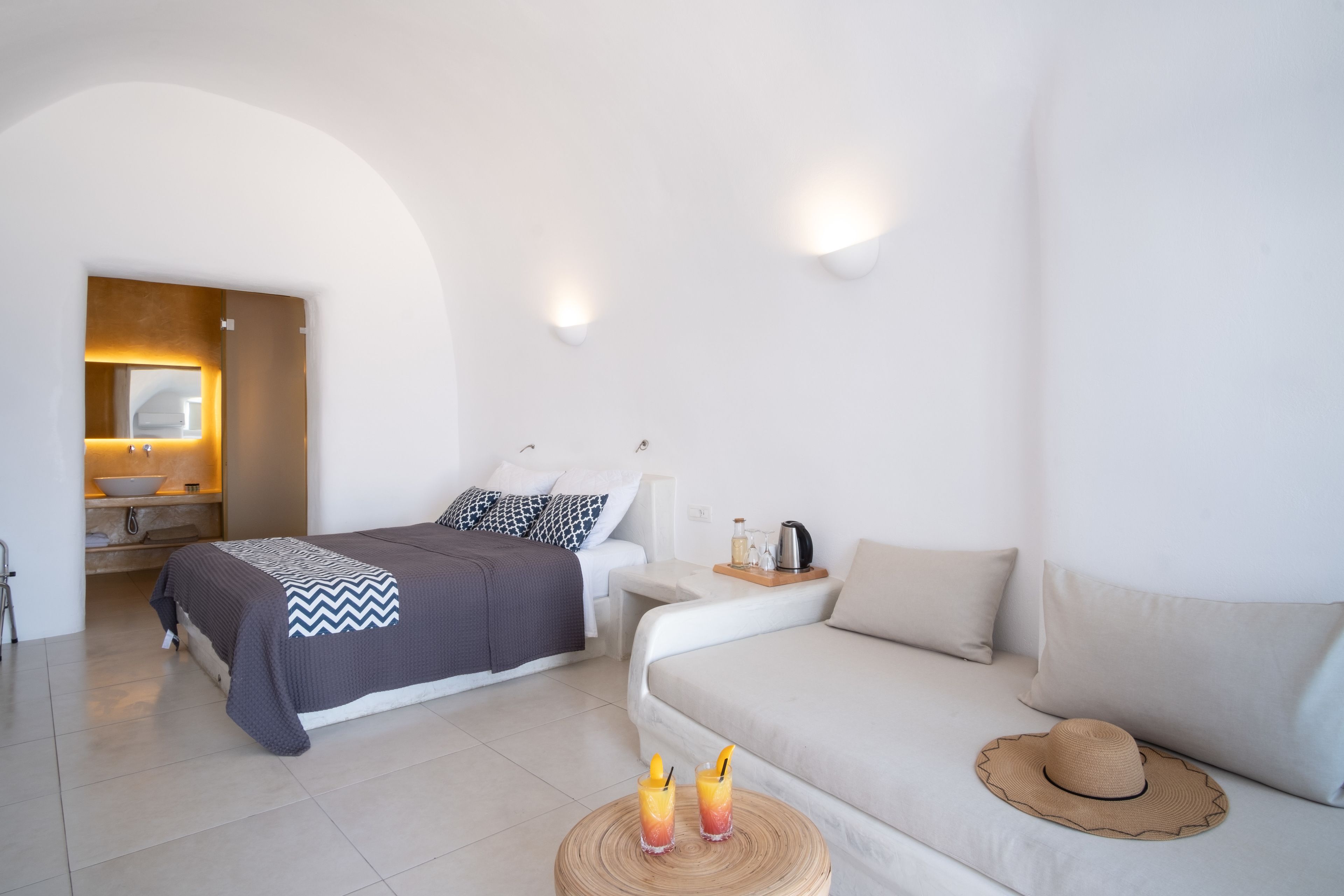 Superior Suite with Caldera View and Private Jacuzzi | Down comforters, pillowtop beds, in-room safe, soundproofing