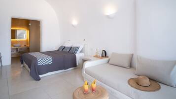 Superior Suite with Caldera View and Private Jacuzzi | Down comforters, pillowtop beds, in-room safe, soundproofing