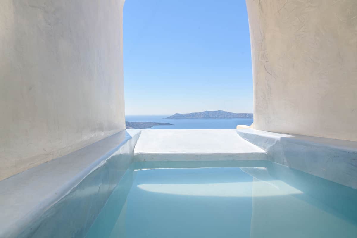 Family Suite with Caldera View and Private Jacuzzi | Down comforters, pillowtop beds, in-room safe, soundproofing