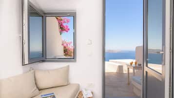 Junior Suite with Caldera View and Private Jacuzzi - A- | Down comforters, pillowtop beds, in-room safe, soundproofing