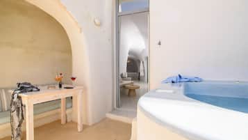 Junior Suite with Caldera View and Private Jacuzzi - B- | Down duvets, pillow-top beds, in-room safe, soundproofing