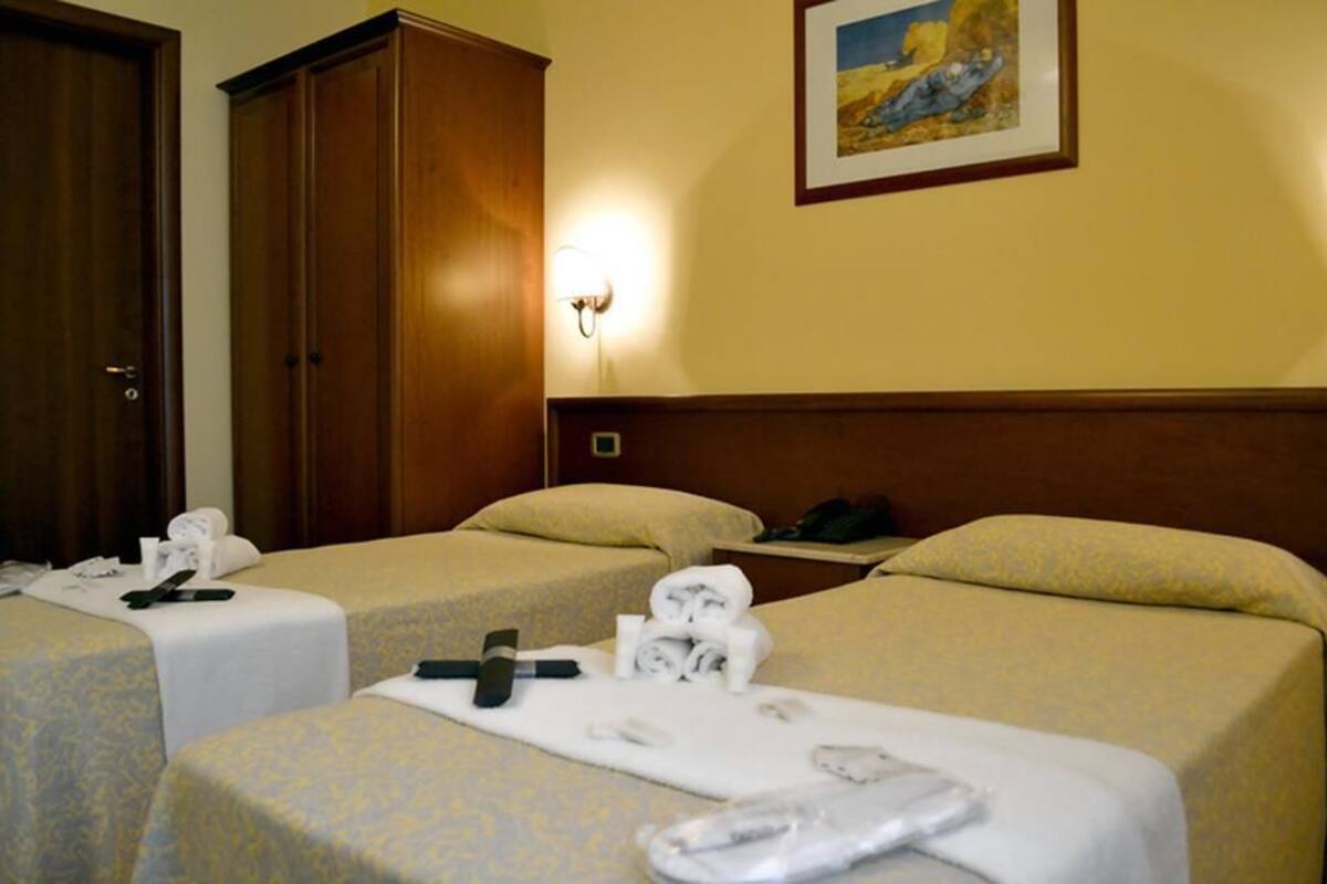 Triple Room | Minibar, in-room safe, desk, iron/ironing board (on request)