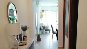 Basic Apartment, 2 Bedrooms, Pool View | Living area | Flat-screen TV - Real del Carmen 202 Playacar by Myrica (Playa del Carmen)