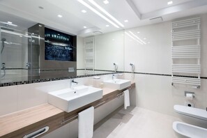 Suite, 1 King Bed | Bathroom | Shower, rainfall showerhead, eco-friendly toiletries, hair dryer