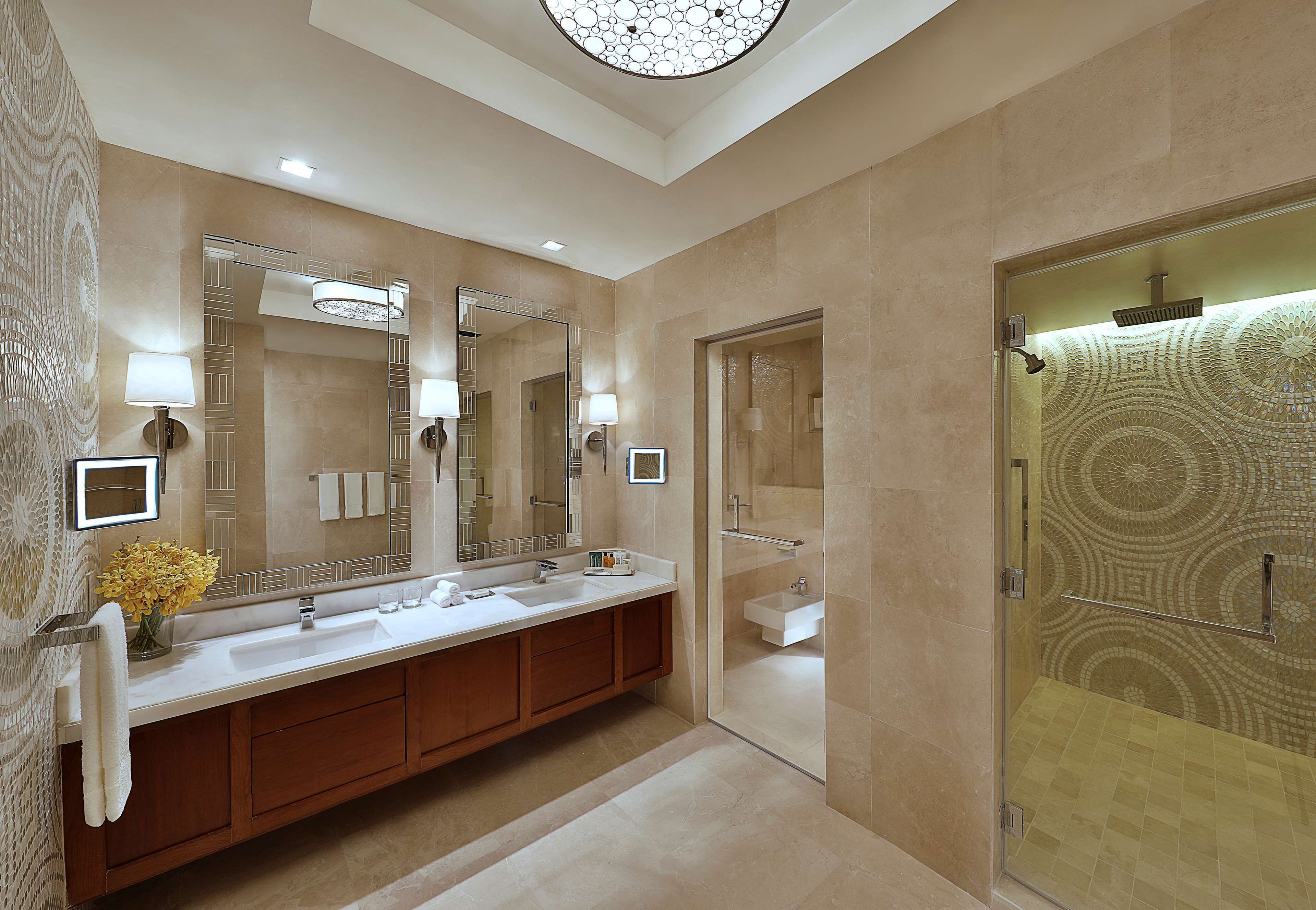 royal suite, 1 king bed, non smoking (haram view) | bathroom | shower, hair dryer, bathrobes, slippers