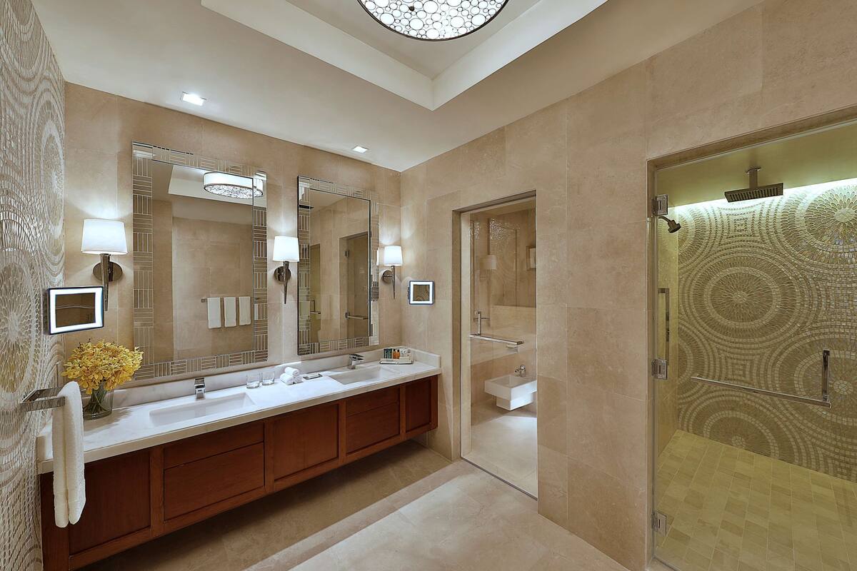 royal suite, 1 king bed, non smoking (haram view) | bathroom | shower, hair dryer, bathrobes, slippers