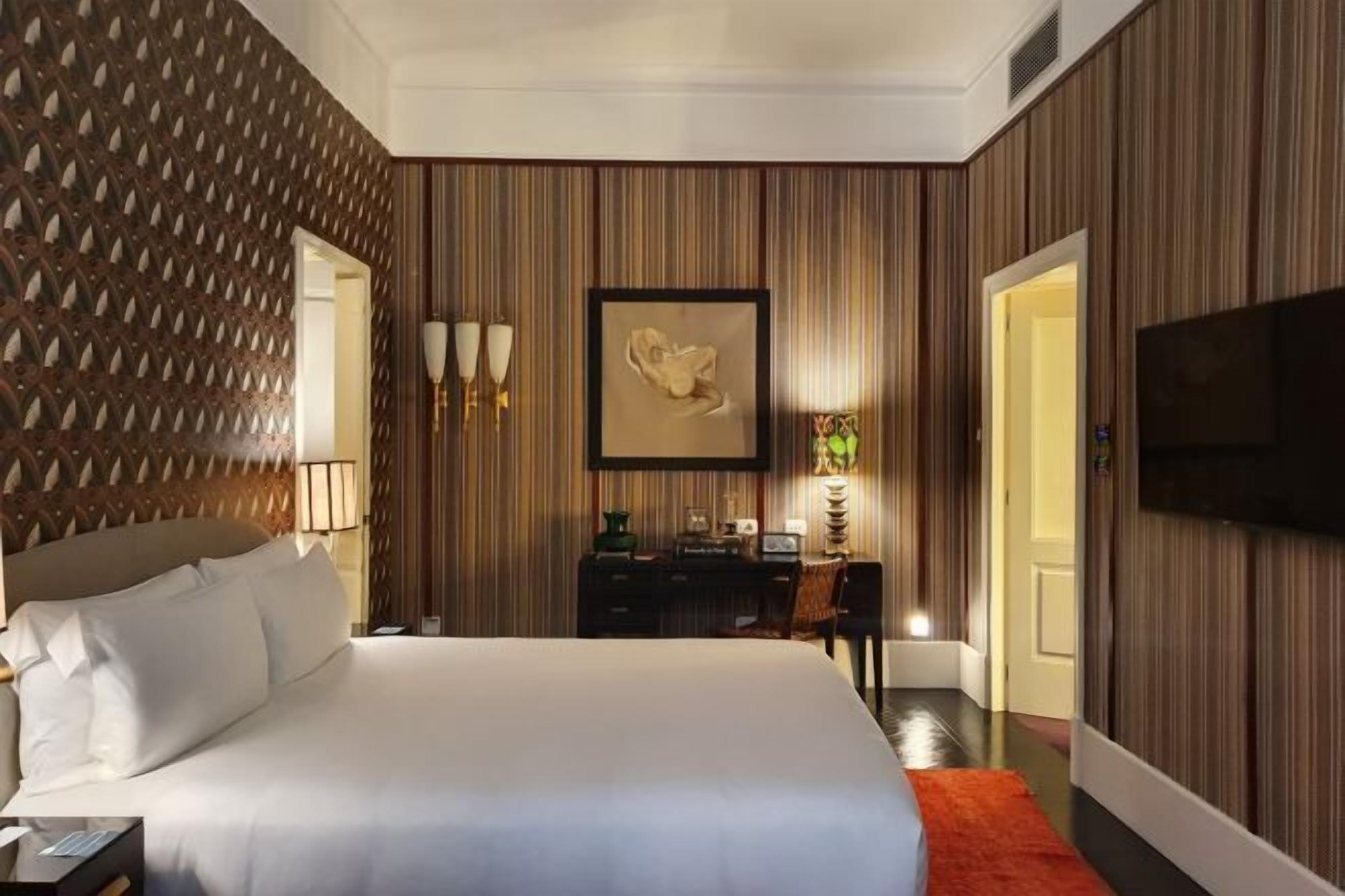 Premium bedding, down comforters, memory foam beds, free minibar items