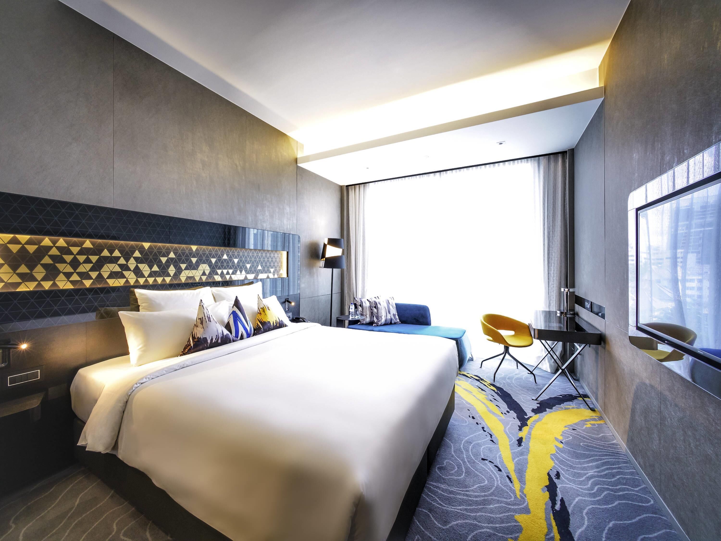 デラックス ダブルルーム ダブルベッド 1 台 | セーフティボックス (室内)、デスク、ノートパソコン用作業スペース、遮光カーテン