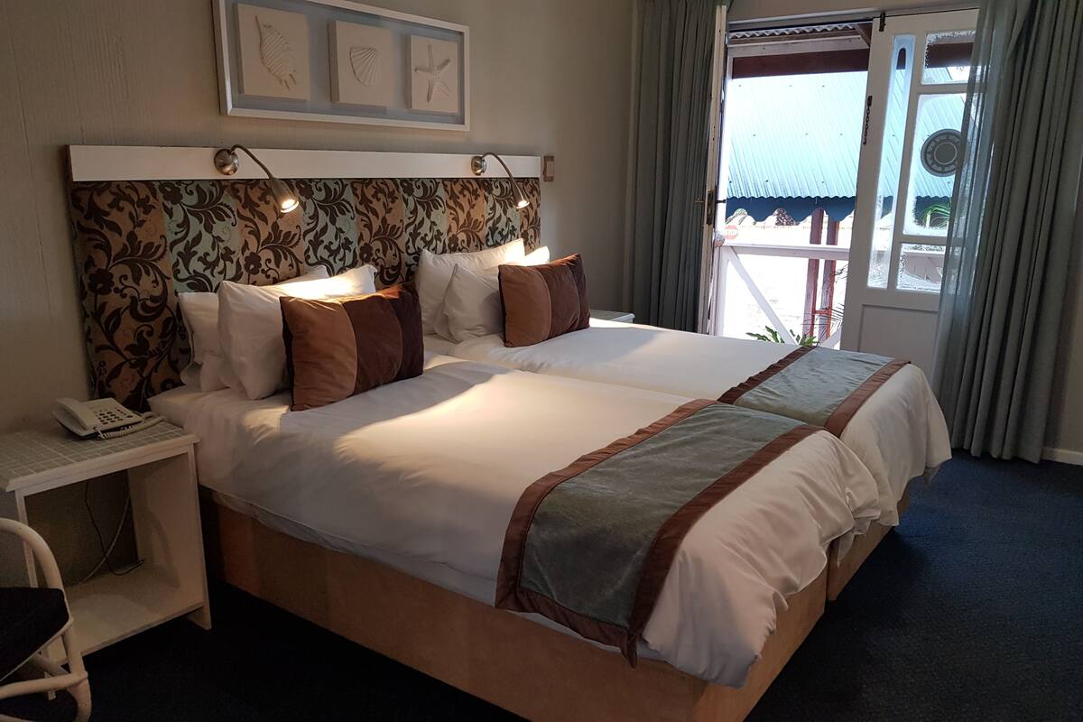 Twin Room (Block A) | Hypo-allergenic bedding available, in-room safe, desk, WiFi (free)
