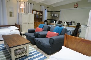 Cottage Luxe, 1 chambre, vue océan, en front de plage | Coin séjour