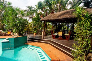 Outdoor pool, pool umbrellas, pool loungers
