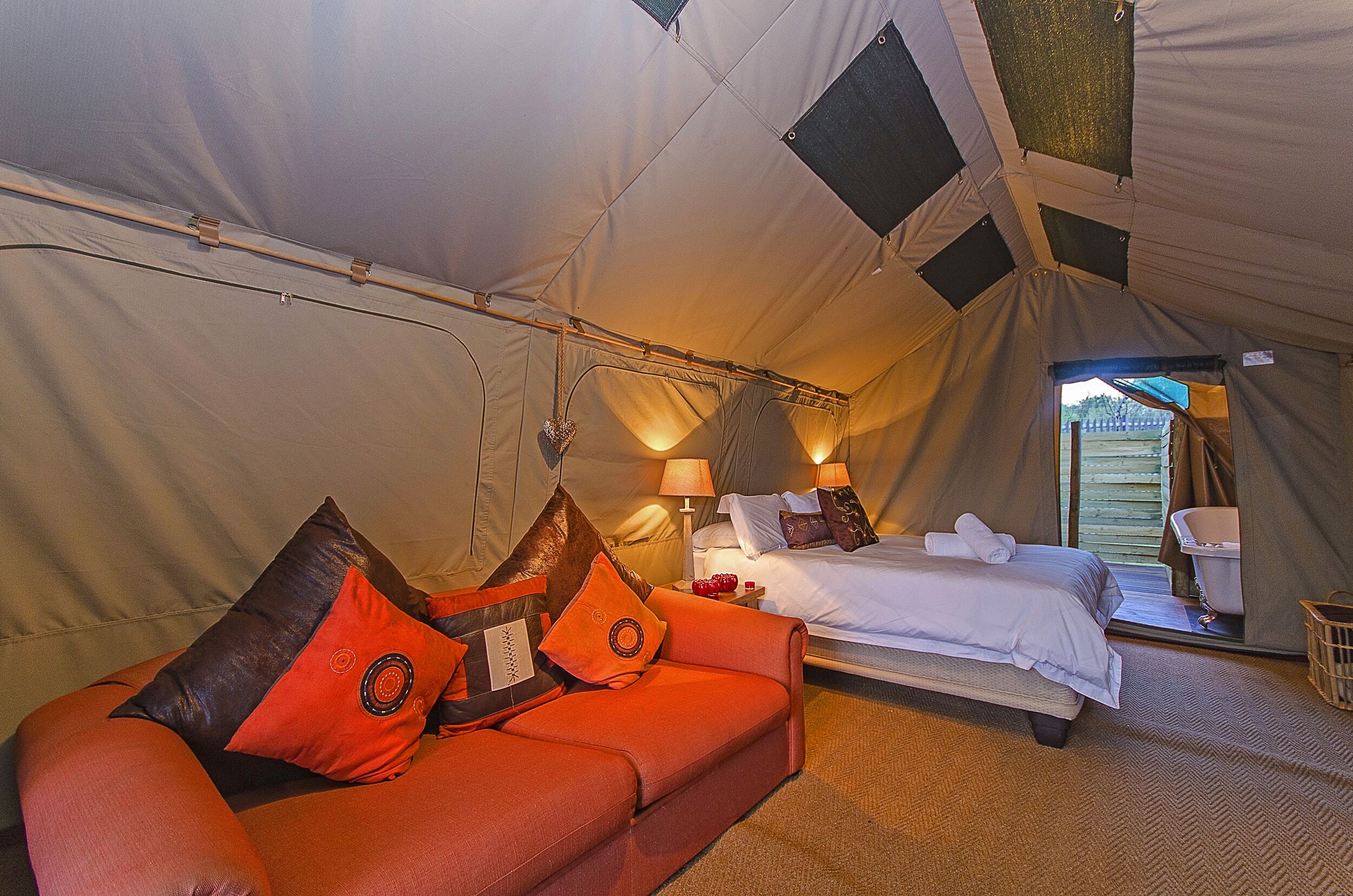 luxury tent | premium bedding, individually decorated, individually furnished