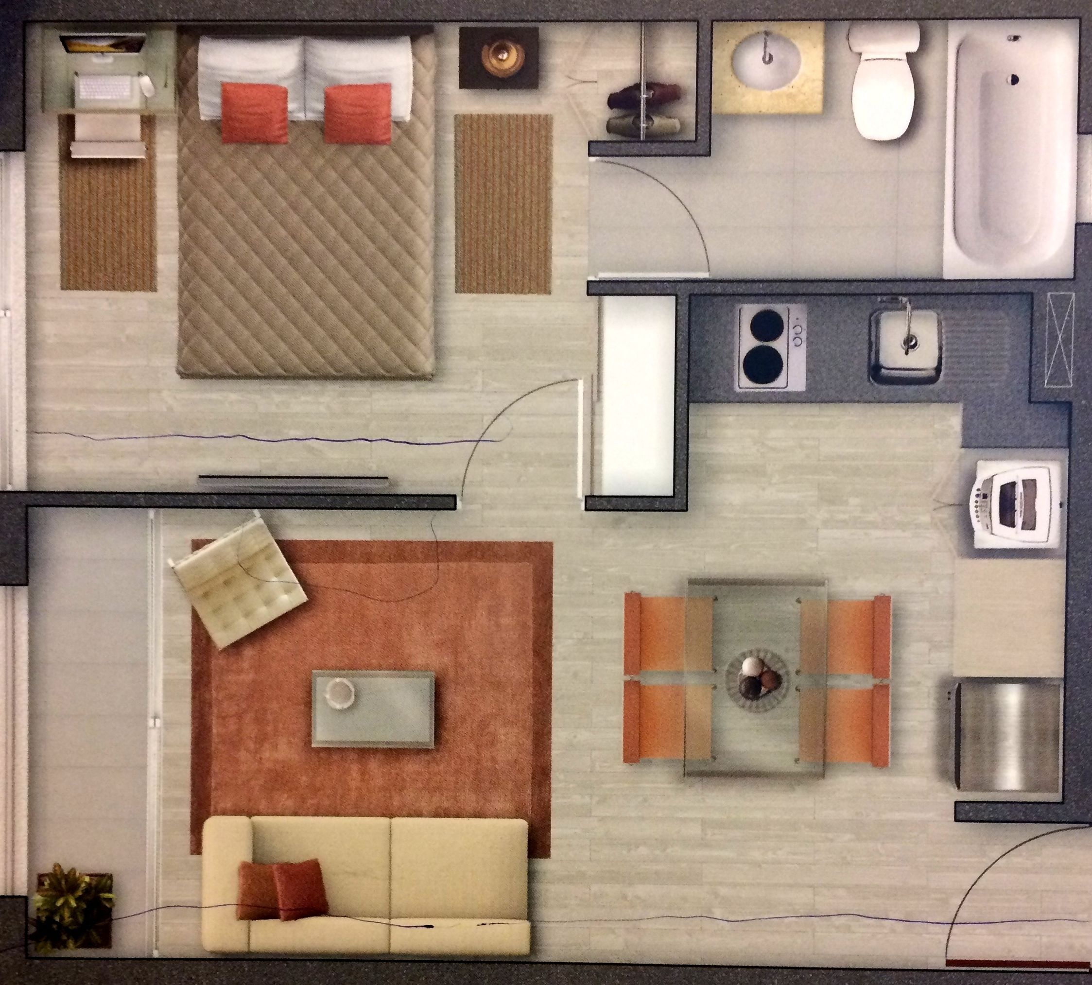 A hotel room layout with a bed, sofa, dining table, and a small kitchen area.