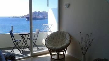 Family Apartment, 2 Bedrooms, Balcony, Ocean View | Living area | 30-inch flat-screen TV with cable channels, TV