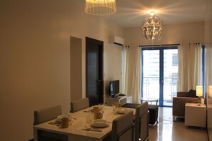 Quarto standard | Área de estar | TV de tela plana